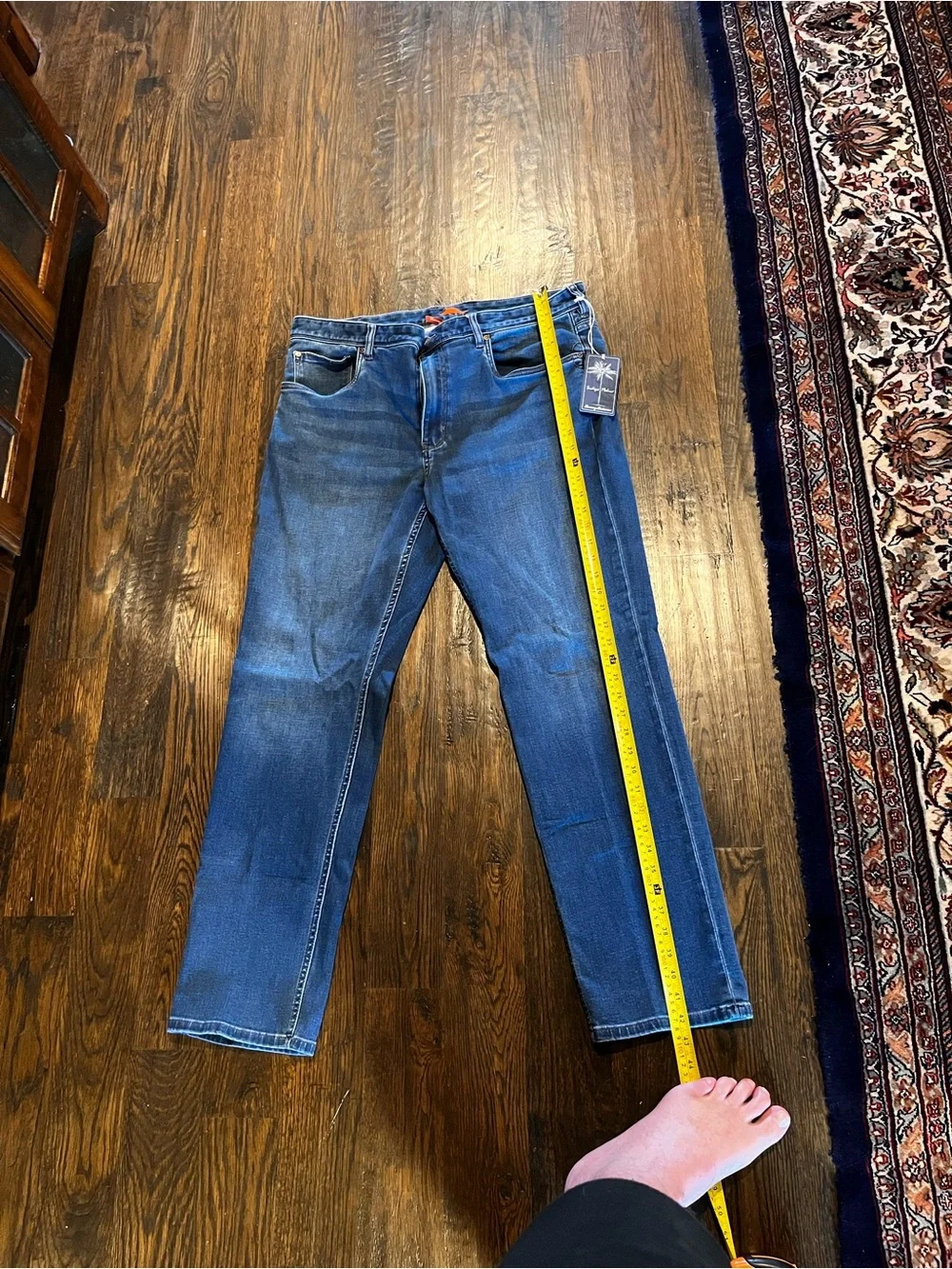 Slim Straight Men's Jeans in Medium Blue Denim. Tommy Bahama Indigo Palms